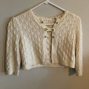 Knit top with lemon buttons